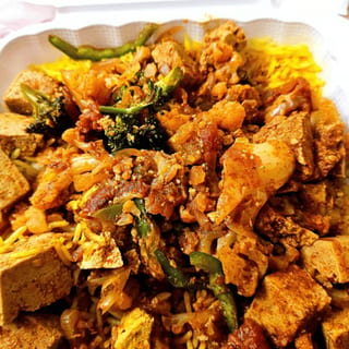 19. Awaze Tofu Tibbs Dinner
